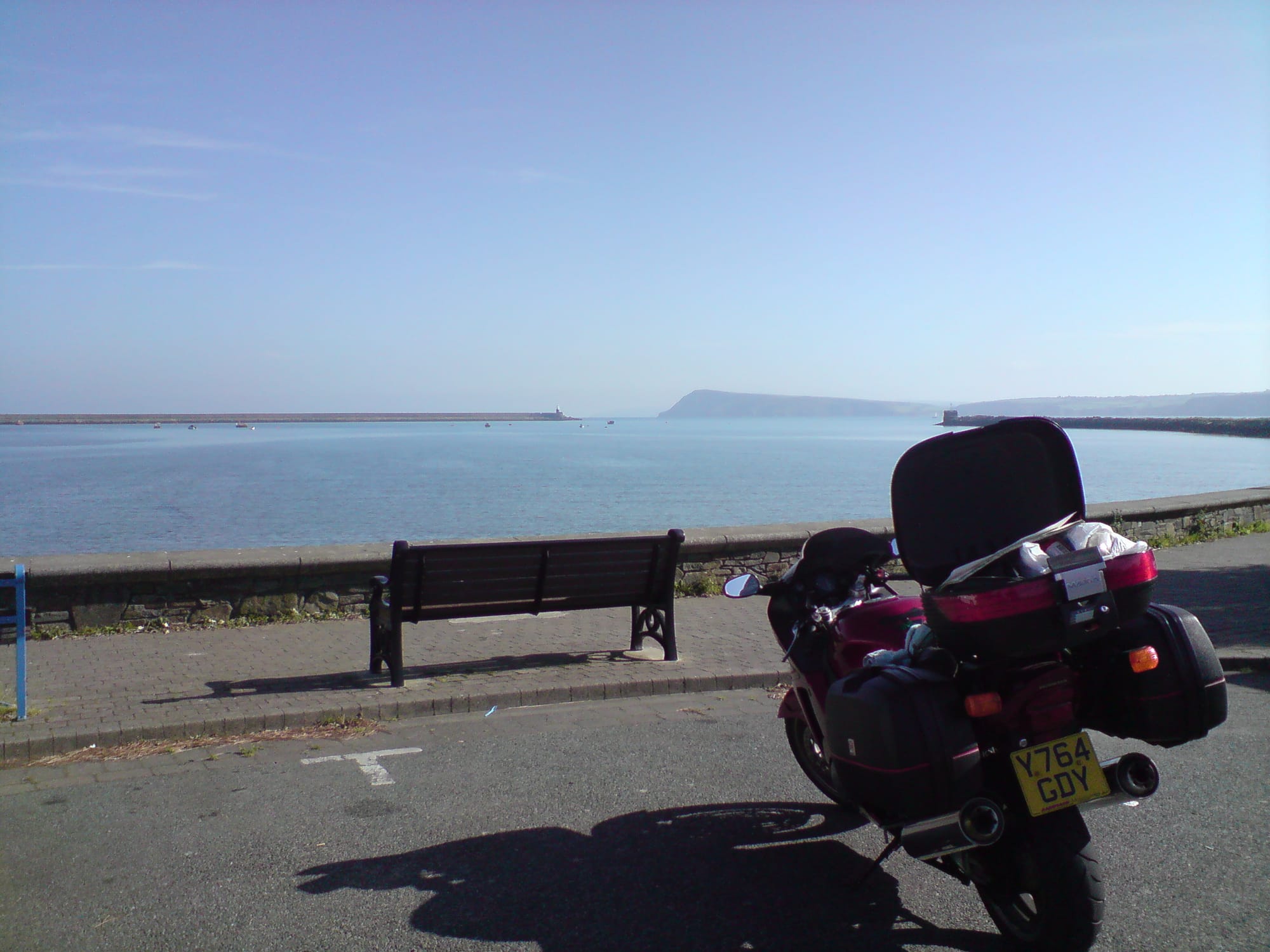 A Honda CBR1100XX Super Blackbird touring bike in Aberystwyth, Wales, representing the era of high-speed European motorcycle travel